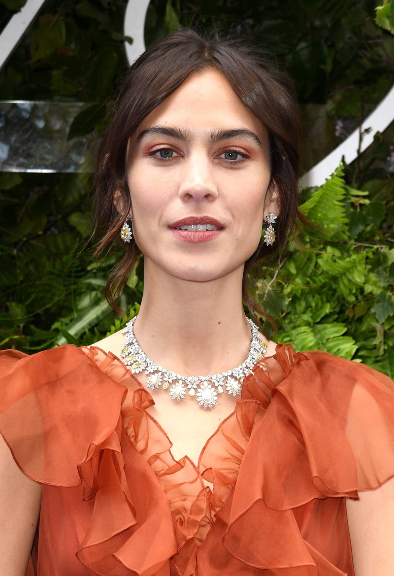 Alexa Chung wears curtain bangs at the Chopard New Store Opening.