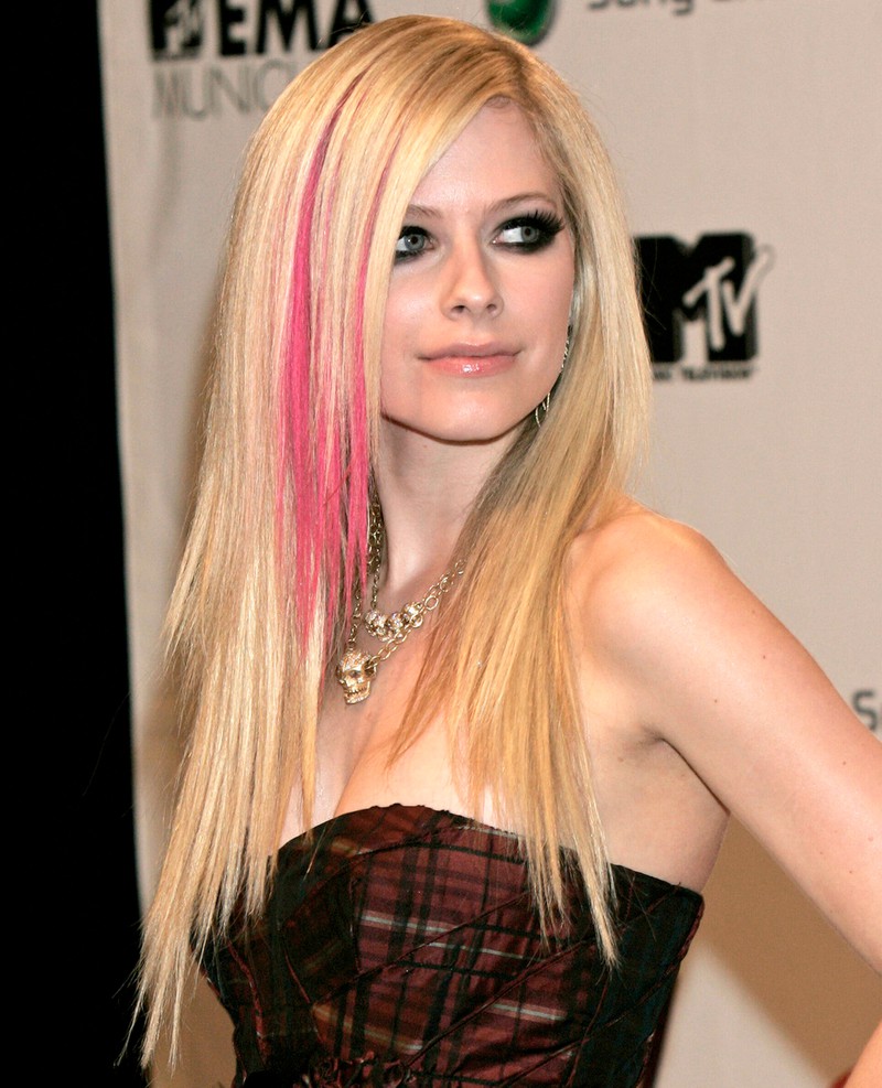 Avril Lavigne set a trend with sleek hair in the 2000s.