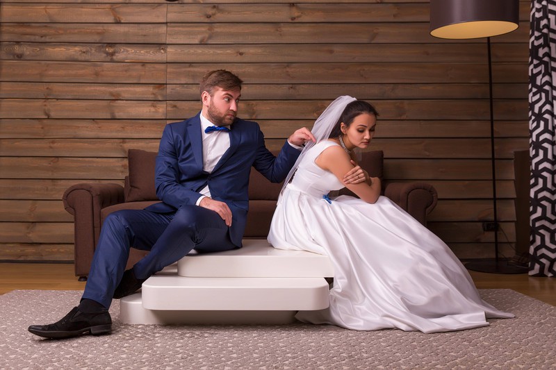 A husband asking her bride for money for the wedding costs.