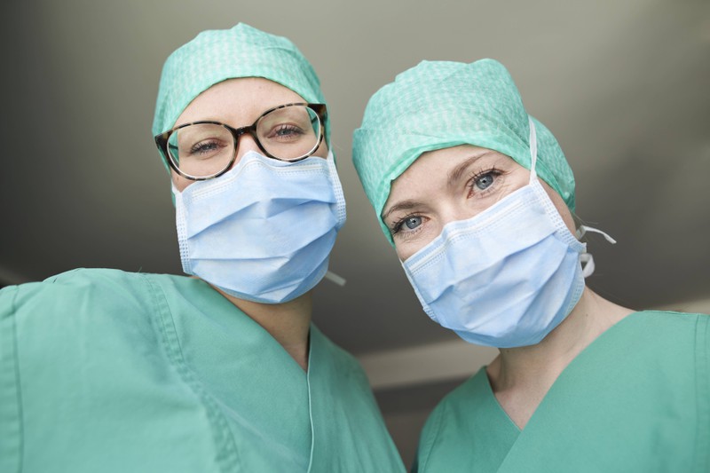 Two doctors ready for surgery.