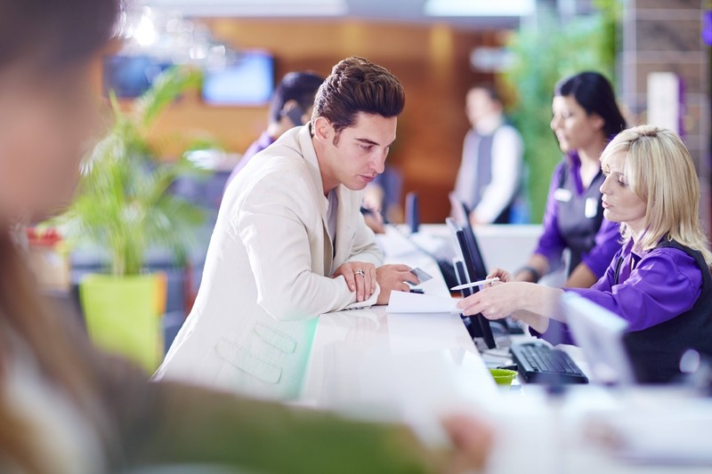 The receptionist is angry with the caterer.