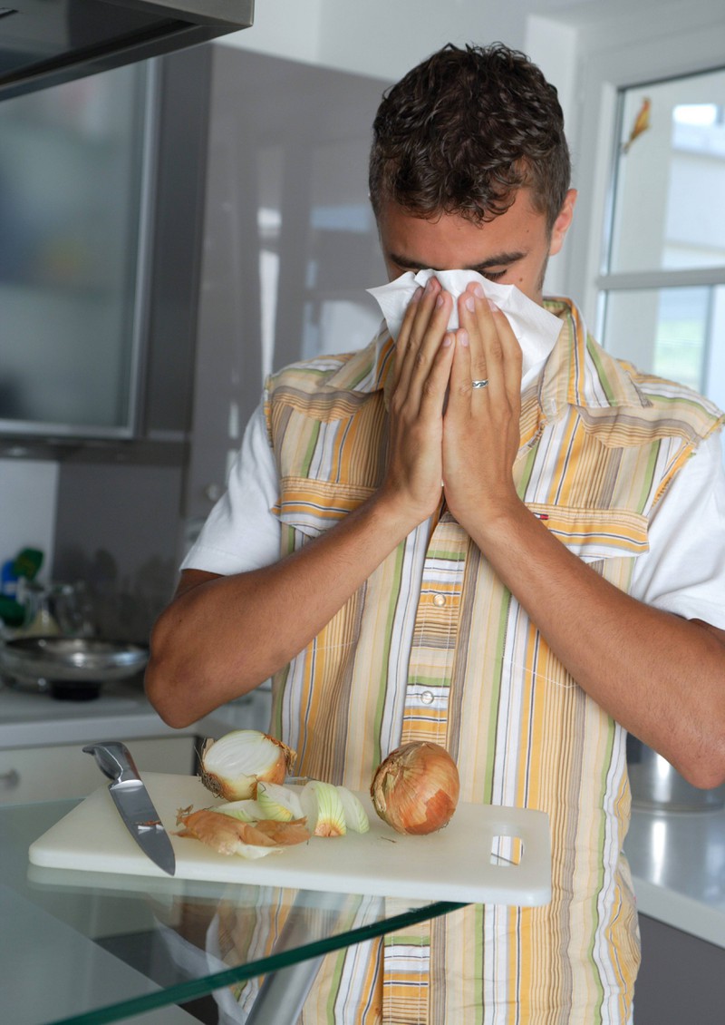 This man uses onions to get fever symptoms.