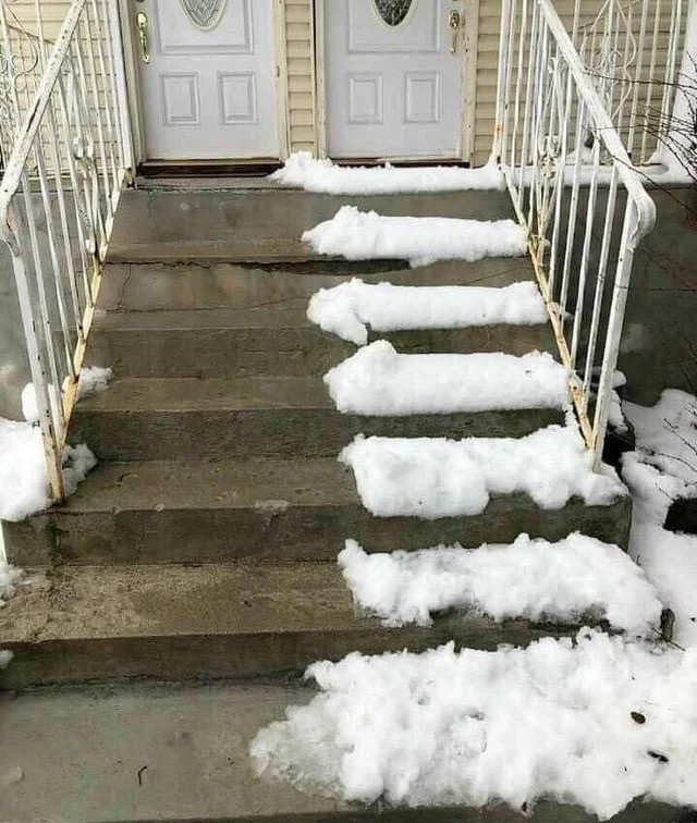 A neighbor only cleared the snow on his side of the stairs.