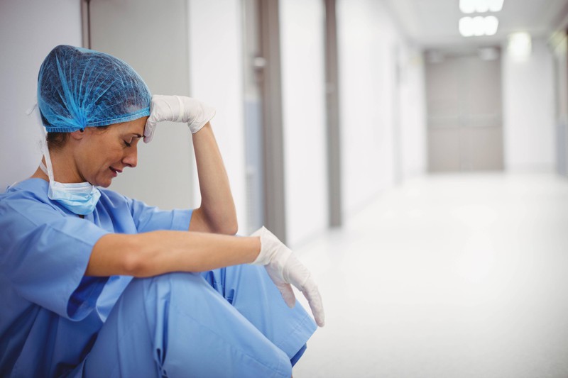 The nurse is desperate because of the patient she just had to take care of.