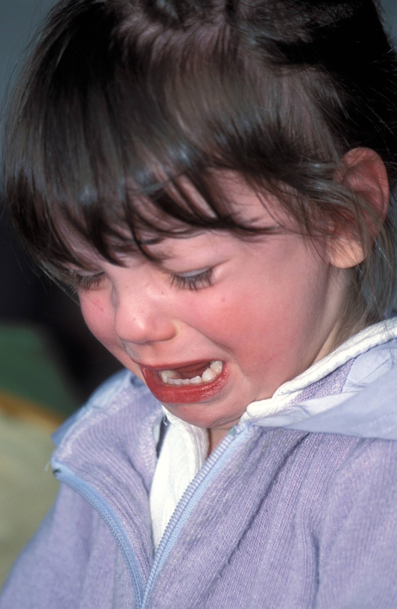 The girl cries because her big sister died the night before.