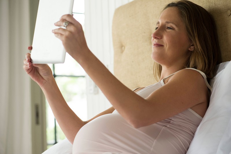 A pregnant women is looking for a name for her baby.