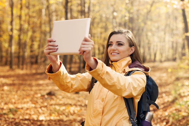 The influencer can't go hiking without constantly updating her followers.