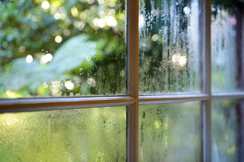 The moisture on the window turned into condensation.