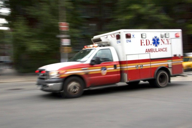 An ambulances races to a patient who's had a heart attack.