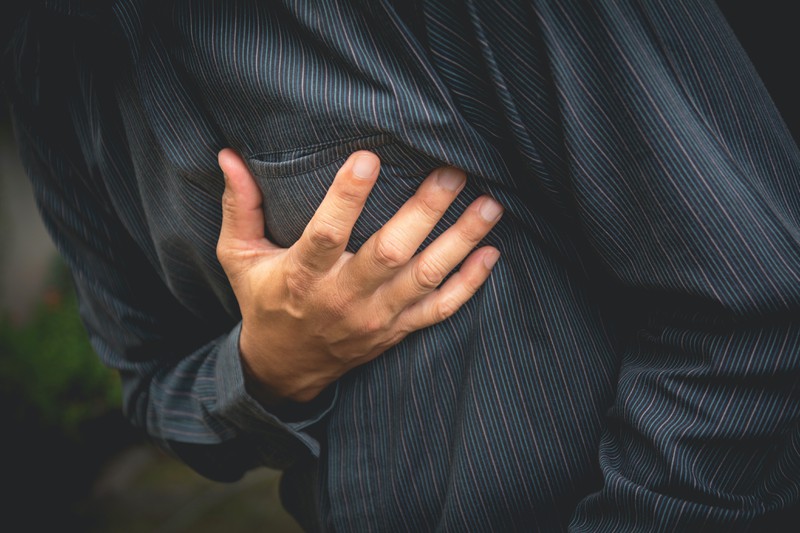 Chest pain can be one sign of having a heart attack.