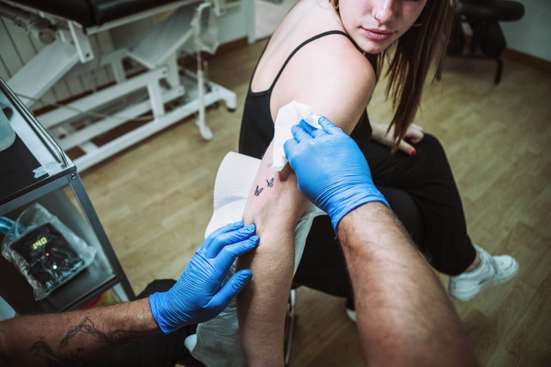 You shouldn't want to cut costs on a new tattoo.