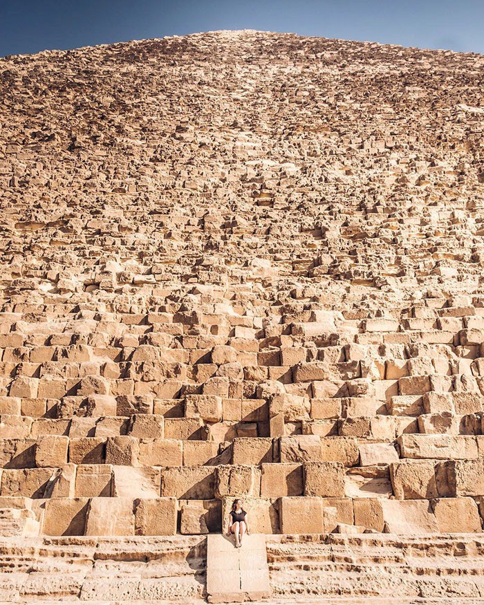 Pyramids compared to a woman