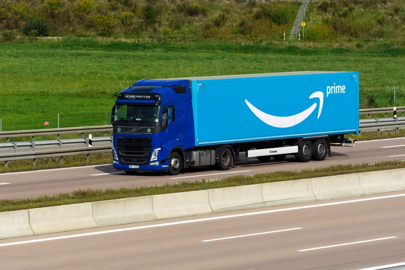 Amazon Prime parcel logistics truck driving on the highway