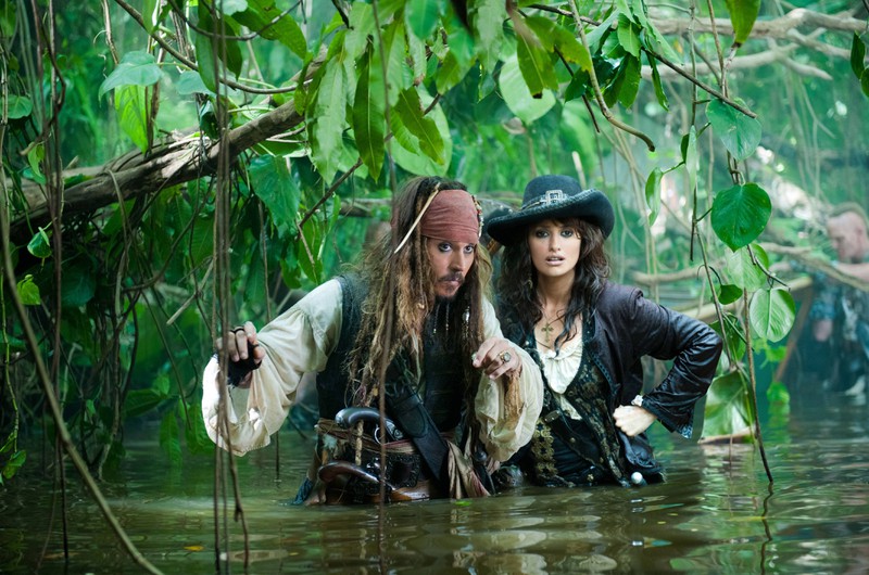 Keira Knightley and Geoffrey Rush in the movie "Pirates of the Caribbean"